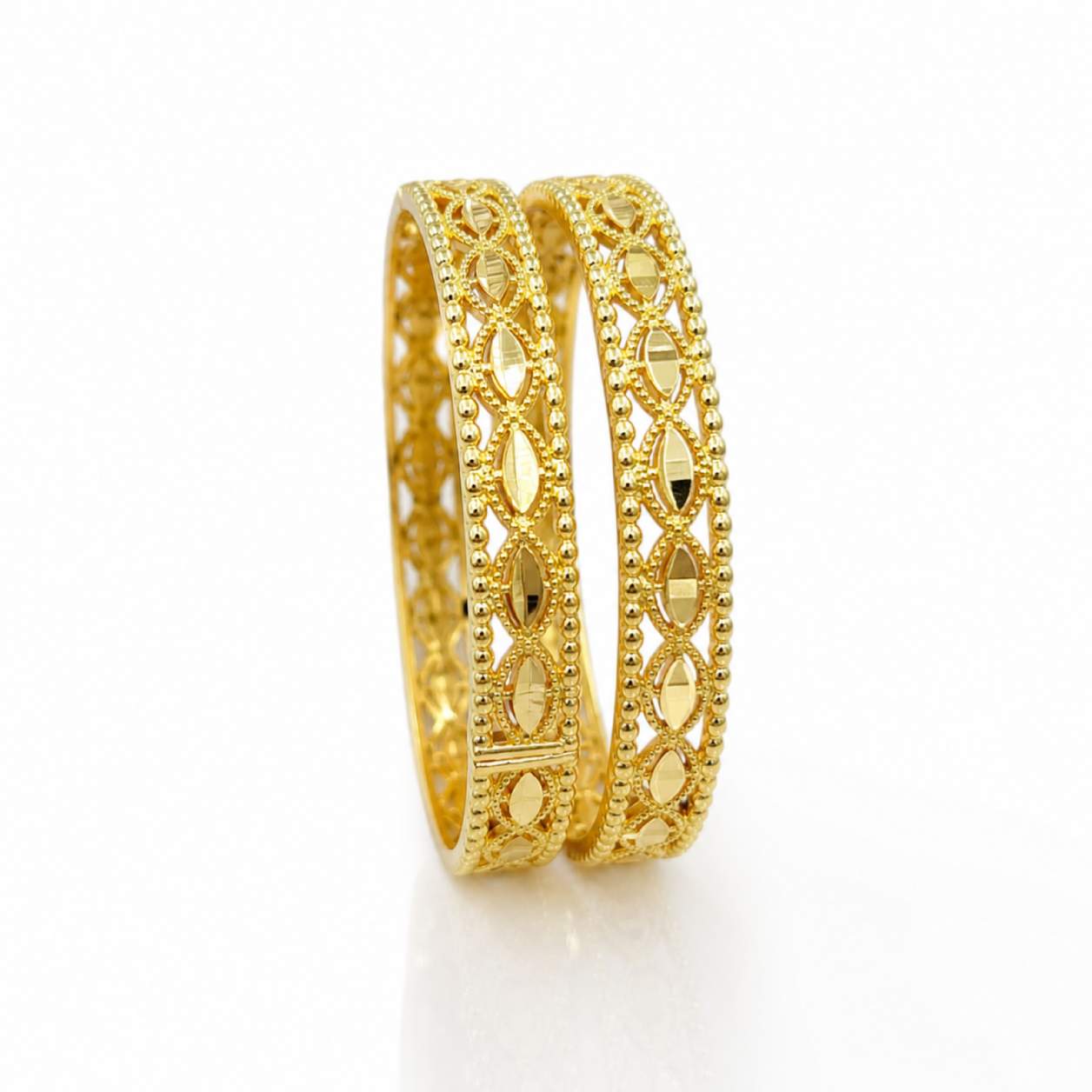 Chevron Spine Pair - wide hinged bangles with chevron ribbed channels and milgrain border