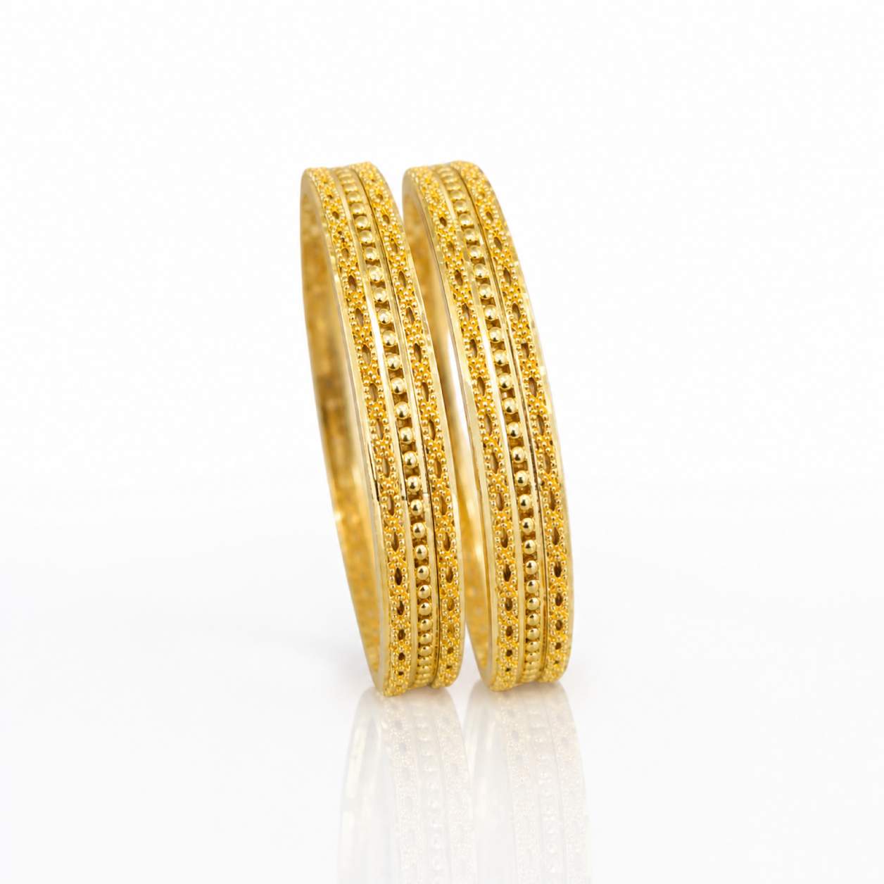 Ladder Grid Tubular Pair - wide tubular bangles with rectangular ladder-grid openwork cutouts