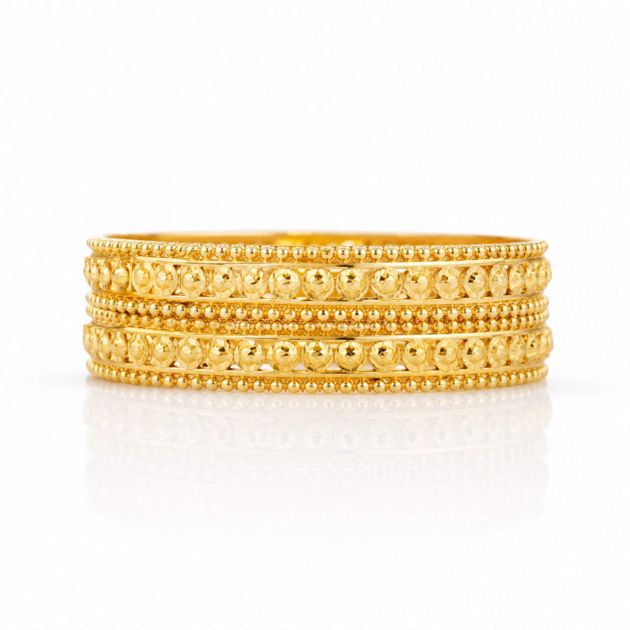 18K Gold Bangle Pair Signature - detail view