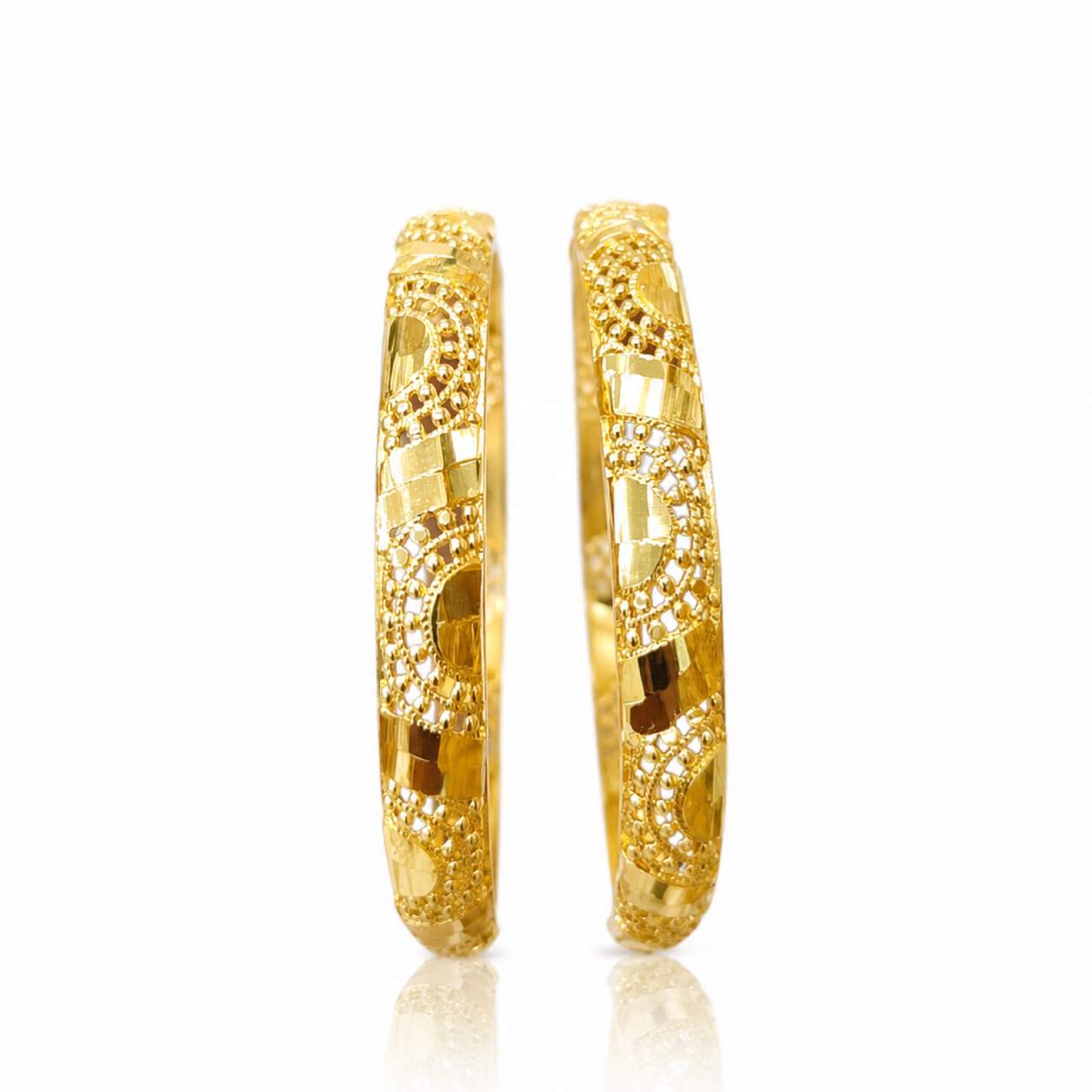 18K Gold Bangle Pair Signature - close-up detail