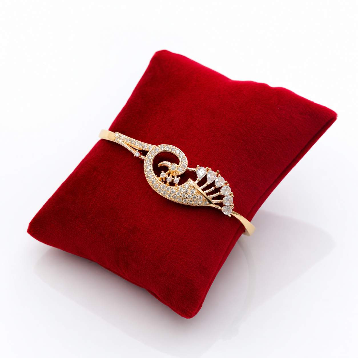 Peacock Bangle - sculptural pavé peacock with pear-shaped crystal tail drops